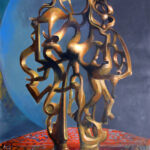 A painting of a gold sculpture.