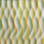 A painting with yellow, green, and blue wavy lines.