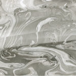 A black and white photograph of a swirling liquid.