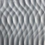 Abstract grey and white wavy pattern.