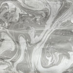 Abstract marbled paper in gray and white.