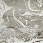 Abstract marbled art in shades of gray.